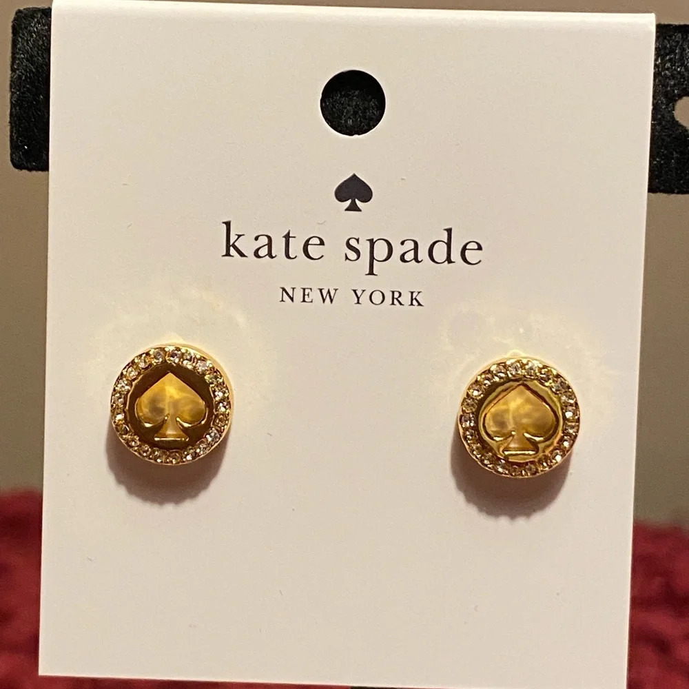Kate Spade “spot the spade” gold tone earrings with spade cut out in the center